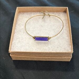 Elegant Gold and Purple Bracelet